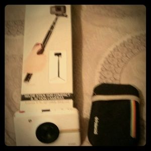 Polaroid Camera with case and a Tripod/selfie stic